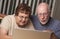 Confused Senior Adult Couple Having Fun on the Computer