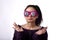 Confused and upset asian woman wear funny glasses, Girl`s face expression feeling worry messy.