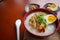 congee porridge with chicken slice, tofu, egg. congee porridge from hong kong. chinese food.