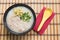 Congee, Rice porridge, Rice gruel, Rice soup on wooden background, Top view
