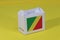 Congo flag on white box with barcode and the color of nation flag on yellow background. The concept of export trading from Congo