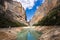 Congost de Mont Rebei, mountain gorge with azure river and canoe, kayaking in Aragon, Catalonia, Spain