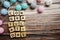 Congratulations alphabet letter with LED Cotton ball Decoration on wooden background