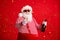 Congratulations. Photo of old man grey beard hold bottle champagne glass make toast wear santa x-mas costume suspenders