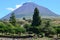 The conical Pico volcano looming over its namesake island Azores archipelago, Portugal