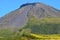 The conical Pico volcano looming over its namesake island Azores archipelago, Portugal