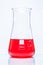 Conical temperature resistant flask with red liquid