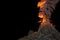 Conical volcano blast eruption with huge smoke pillar and fire isolated on black, troubles because of natural disaster and