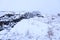 The conjunction of the Eurasian and American plates at Pingvellir in winter, Iceland