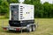 Connected large rental diesel generator on a mobile trailer for outdoor event power supply