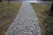 Connecting the park path and sidewalk to the asphalt road using a strip of concrete blocks with protrusions for the blind. they kn