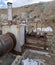 The connection of a large rusty pipe at an abandoned mercury mine in Nevada, USA