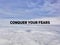 CONQUER YOUR FEARS text with nature background. Inspirational and motivational concept. Stock photo.