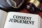 Consent judgement and a gavel.