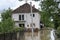 The consequences of flooding, flooded house.