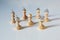 Conspiracy theory and manipulation concept in coronavirus time, group of pawn chess pieces with tinfoil helmets on their heads are