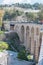 CONSTANTINE, ALGERIA - MAR 7, 2017: Sidi Rasheed Bridge part of the Rhumel siting high on the rocks with a view of the old city.Th