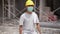 constraction worker wearing face mask on site preventing virus spread