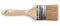 Construction brush with wooden handle on white background