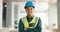 Construction, building and construction worker, man and smile in portrait, employee at construction site with work vest