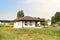 Construction of country modern house. Cottages, townhouses and line suburb houses. Unfinished private home of blocks on a