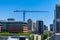 Construction Crane in downtown Austin Texas building a new Highrise on a clear day