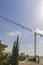 Construction crane in a neighborhood vertical