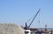 Construction of the Crimean bridge. Piles of rubble and cranes lifted. Construction and repair.