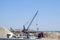 Construction of the Crimean bridge. Piles of rubble and cranes lifted. Construction and repair.