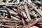 Construction debris - old wooden planks, bars and rusty metal pipes