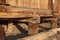 Construction detail of wood piers and beams supporting an old building, American Southwest