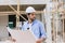 Construction engineer builder work in construction site. Architect home project foreman chief designer working with floor plan