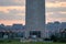 Construction equipment and trailers set up in front of the Washington Monument as repairs are