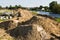 Construction of a floodbank or levee along a river