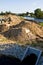 Construction of a floodbank or levee along a river