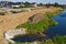 Construction of a floodbank or levee along a river