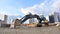 Construction of foundation excavator works in sand pit. Groundworks, site levelling, construction of reinforced ground beams on