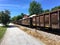 Construction Freight Train Cars with Large Boulders