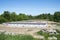 Construction of garages in the cleared area among the forest. The concept of imbalance of industry and ecology