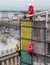 Construction of a glass wall, crane and industrial climbers.