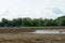 Construction ground near Zurich airport with some construction machinery and some water gathered.