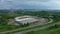 Construction halls industrial factory drone aerial video shot production warehouse building complexes hall fertile land