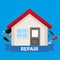 Construction and home renovation. House with tools and tape on a