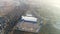 Construction of a large factory, Industrial exterior, panoramic view from the air. Construction site, metal structure