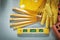 Construction level red bricks hard hat safety gloves wooden mete