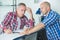 Construction manager resolving problem with colleague