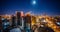 Construction of modern high multistory residential buildings, night aerial view of building yard