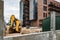 Construction of a multi-storey building with scaffolding. Construction site background.