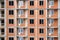 Construction of a new brick residential building with an inset of plastic modern windows