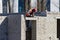 Construction of a new house. Workers erect the second floor of a building on a construction site